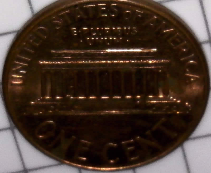 2007-P-Lincoln-Cent-Struck-Through-Wire-Brush-Bristle-Maybe-Or-Thread?
